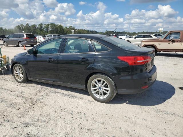 Photo 1 VIN: 1FADP3F27GL394988 - FORD FOCUS SE 