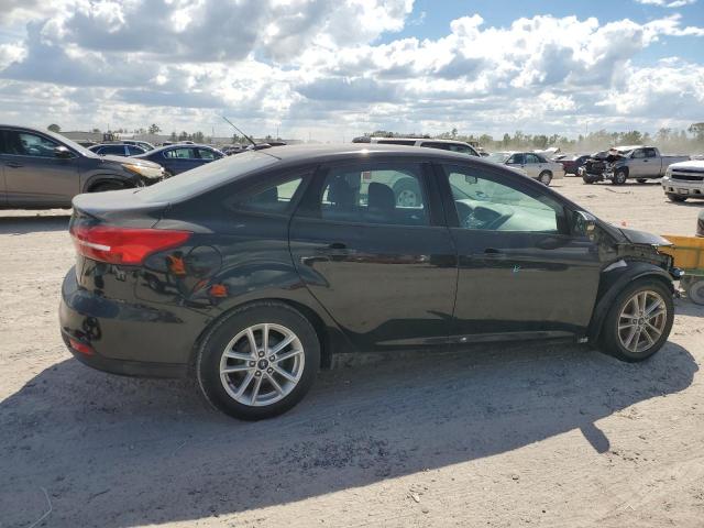 Photo 2 VIN: 1FADP3F27GL394988 - FORD FOCUS SE 