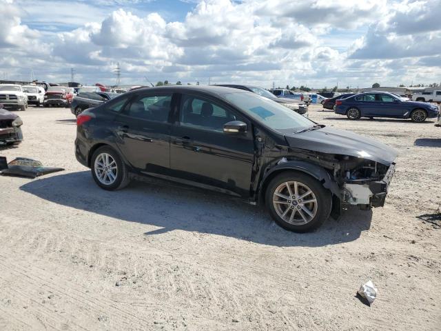 Photo 3 VIN: 1FADP3F27GL394988 - FORD FOCUS SE 