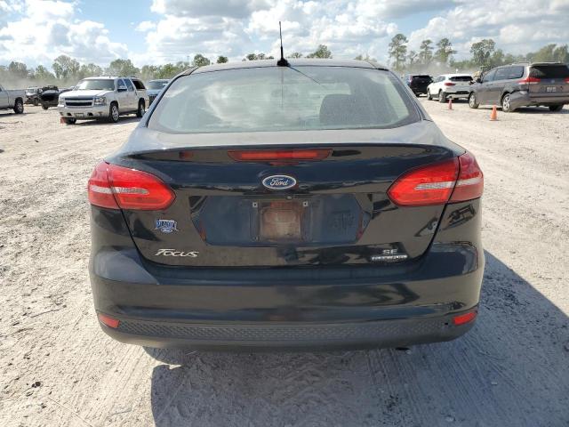 Photo 5 VIN: 1FADP3F27GL394988 - FORD FOCUS SE 