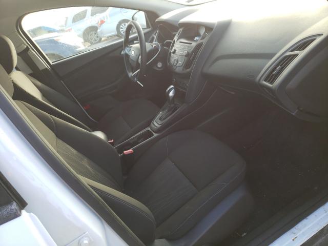 Photo 4 VIN: 1FADP3F27GL399723 - FORD FOCUS SE 