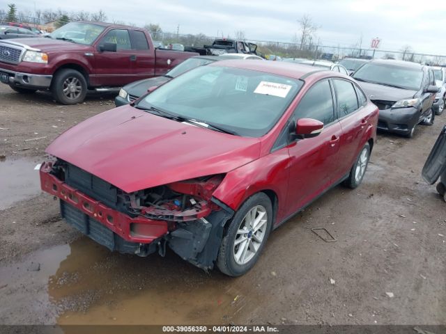 Photo 1 VIN: 1FADP3F27GL401633 - FORD FOCUS 