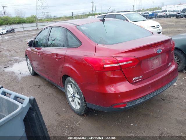 Photo 2 VIN: 1FADP3F27GL401633 - FORD FOCUS 