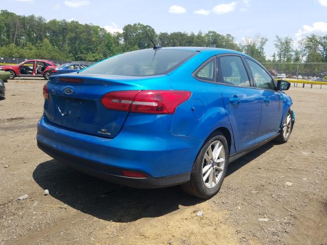 Photo 3 VIN: 1FADP3F27GL402605 - FORD FOCUS SE 