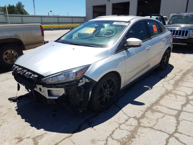 Photo 1 VIN: 1FADP3F27GL405150 - FORD FOCUS SE 