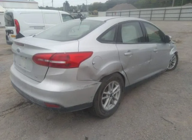 Photo 3 VIN: 1FADP3F27HL218833 - FORD FOCUS 