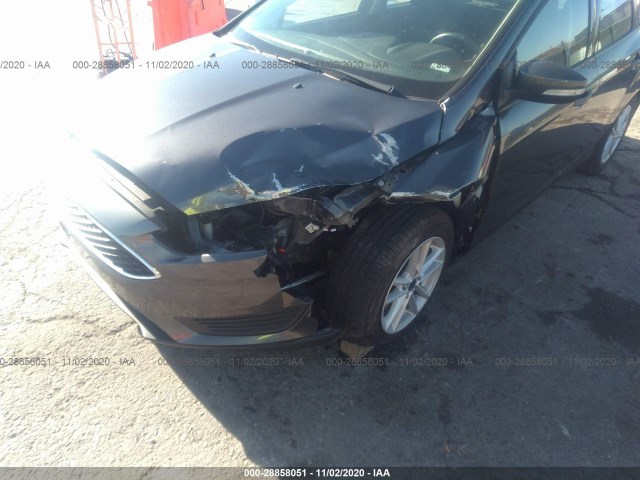 Photo 5 VIN: 1FADP3F27HL244803 - FORD FOCUS 