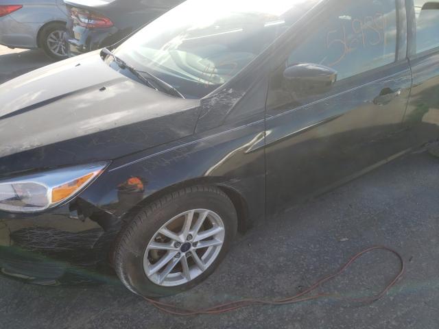 Photo 8 VIN: 1FADP3F27HL263268 - FORD FOCUS 