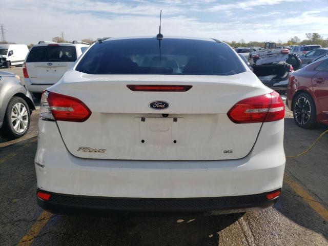 Photo 5 VIN: 1FADP3F27HL275629 - FORD FOCUS SE 