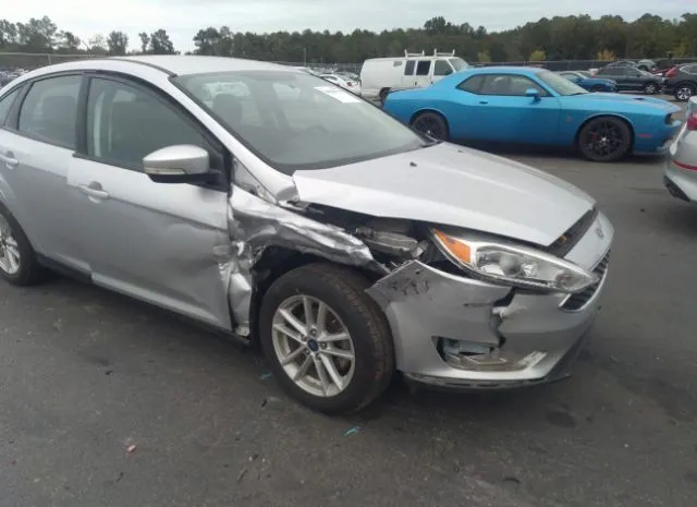 Photo 5 VIN: 1FADP3F27HL281673 - FORD FOCUS 