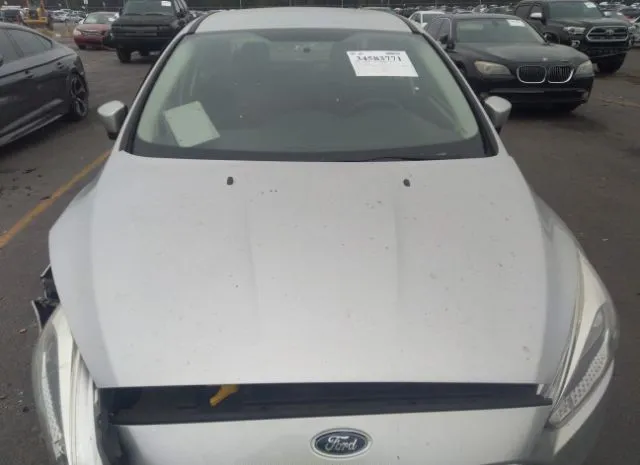 Photo 9 VIN: 1FADP3F27HL281673 - FORD FOCUS 