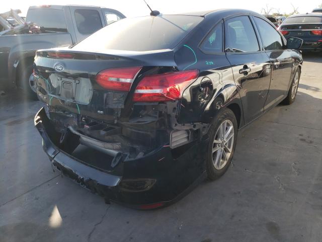 Photo 3 VIN: 1FADP3F27JL208728 - FORD FOCUS 