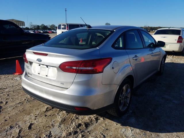 Photo 3 VIN: 1FADP3F27JL234701 - FORD FOCUS 