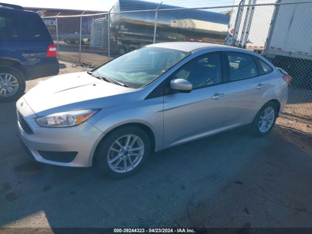 Photo 1 VIN: 1FADP3F27JL252602 - FORD FOCUS 