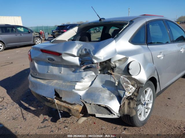 Photo 5 VIN: 1FADP3F27JL252602 - FORD FOCUS 