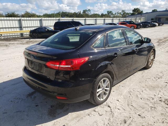 Photo 3 VIN: 1FADP3F27JL264362 - FORD FOCUS 