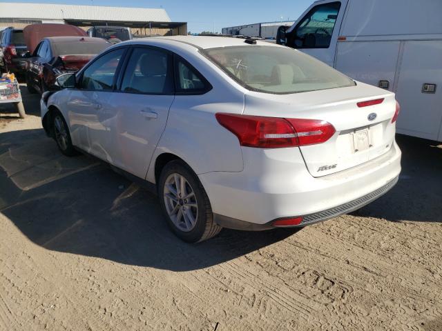 Photo 2 VIN: 1FADP3F27JL279797 - FORD FOCUS 