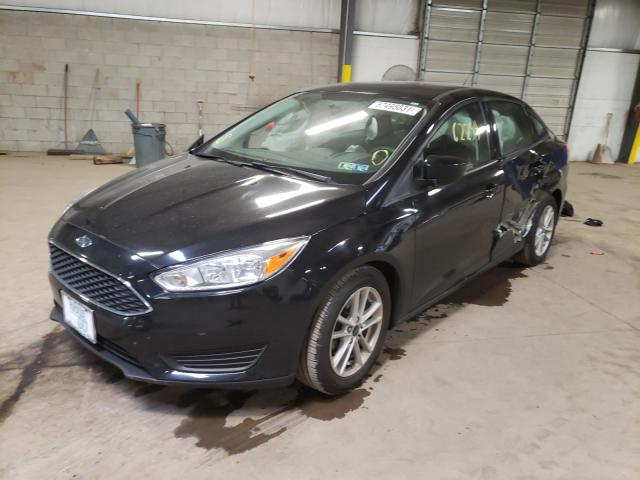 Photo 1 VIN: 1FADP3F27JL295403 - FORD FOCUS SE 