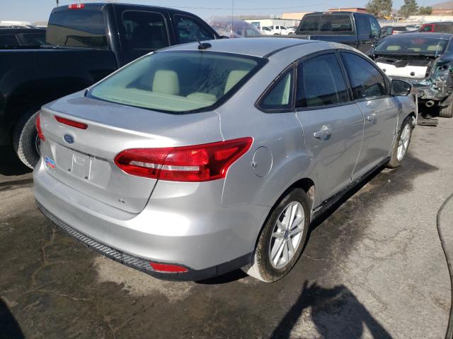 Photo 3 VIN: 1FADP3F27JL315035 - FORD FOCUS 