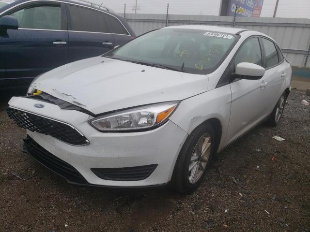 Photo 1 VIN: 1FADP3F27JL324026 - FORD FOCUS 