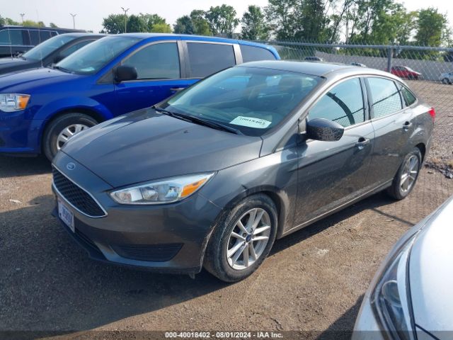 Photo 1 VIN: 1FADP3F27JL327783 - FORD FOCUS 