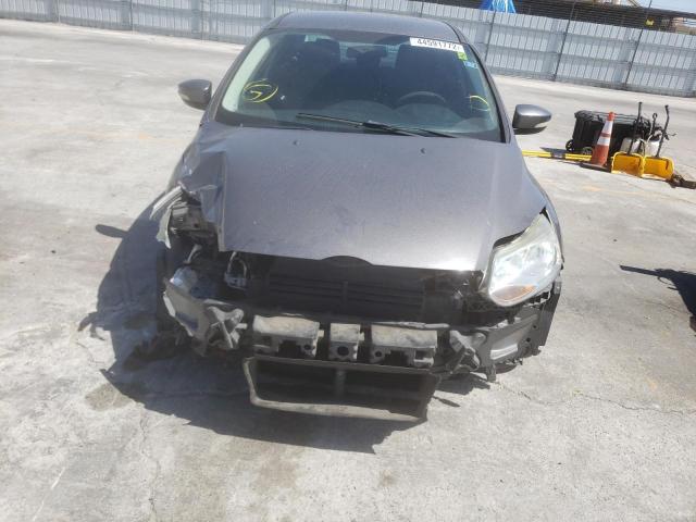 Photo 8 VIN: 1FADP3F28DL104172 - FORD FOCUS SE 