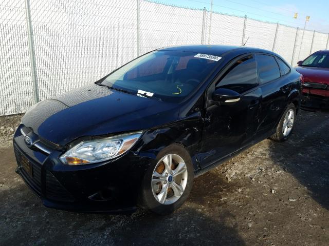 Photo 1 VIN: 1FADP3F28DL106410 - FORD FOCUS SE 