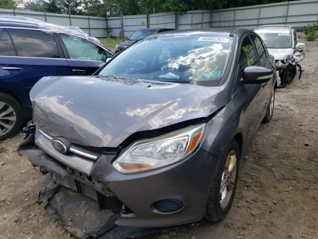 Photo 1 VIN: 1FADP3F28DL153579 - FORD FOCUS SE 