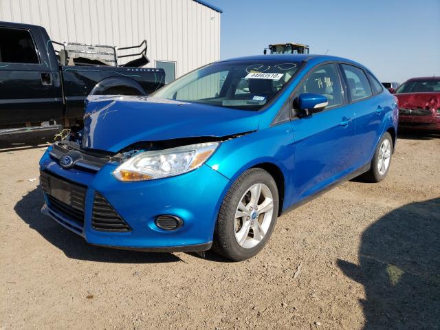 Photo 1 VIN: 1FADP3F28DL177008 - FORD FOCUS SE 