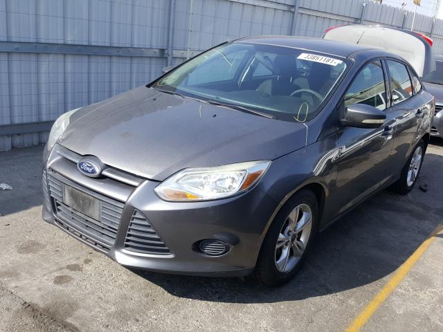 Photo 1 VIN: 1FADP3F28DL213165 - FORD FOCUS SE 