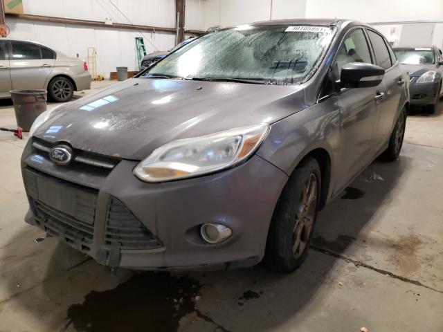 Photo 1 VIN: 1FADP3F28DL228118 - FORD FOCUS SE 