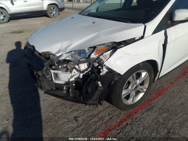 Photo 5 VIN: 1FADP3F28DL242570 - FORD FOCUS 