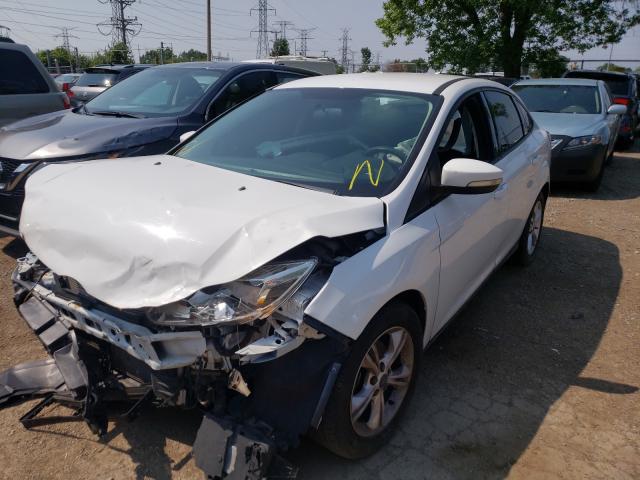 Photo 1 VIN: 1FADP3F28DL243105 - FORD FOCUS SE 