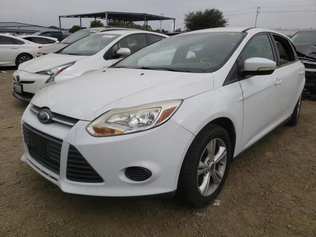 Photo 1 VIN: 1FADP3F28DL264181 - FORD FOCUS SE 