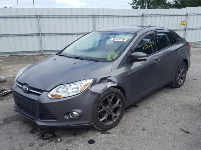 Photo 1 VIN: 1FADP3F28DL265329 - FORD FOCUS SE 