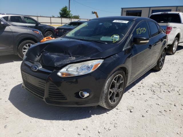 Photo 1 VIN: 1FADP3F28DL296385 - FORD FOCUS SE 