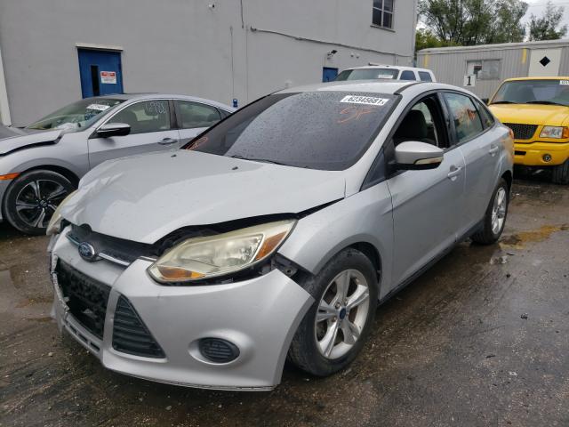 Photo 1 VIN: 1FADP3F28DL320992 - FORD FOCUS SE 