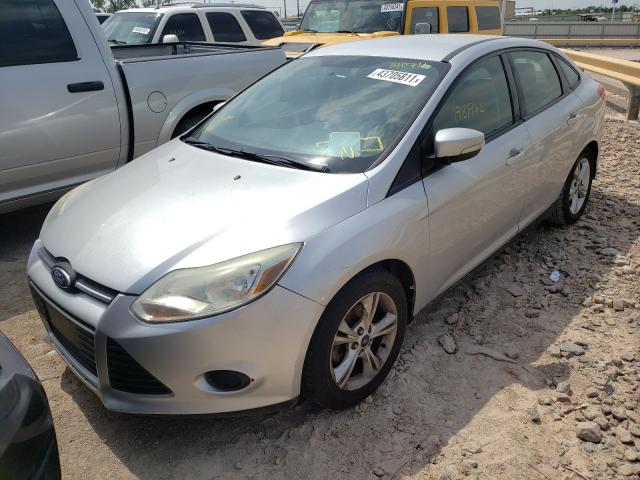 Photo 1 VIN: 1FADP3F28DL340711 - FORD FOCUS SE 