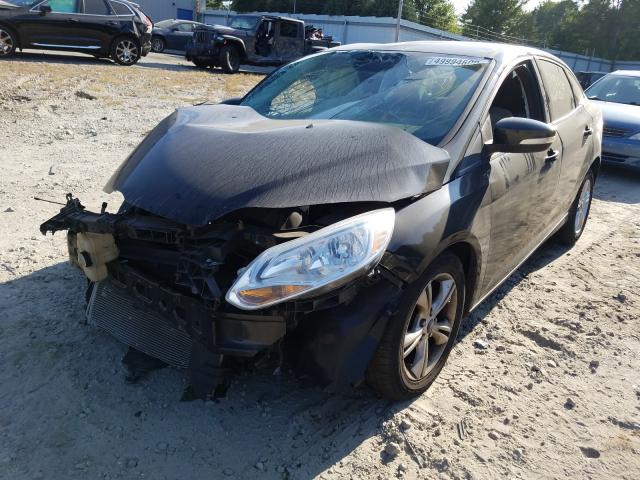 Photo 1 VIN: 1FADP3F28DL358481 - FORD FOCUS SE 