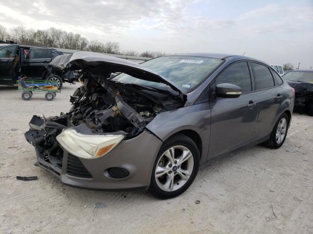 Photo 1 VIN: 1FADP3F28DL372963 - FORD FOCUS SE 