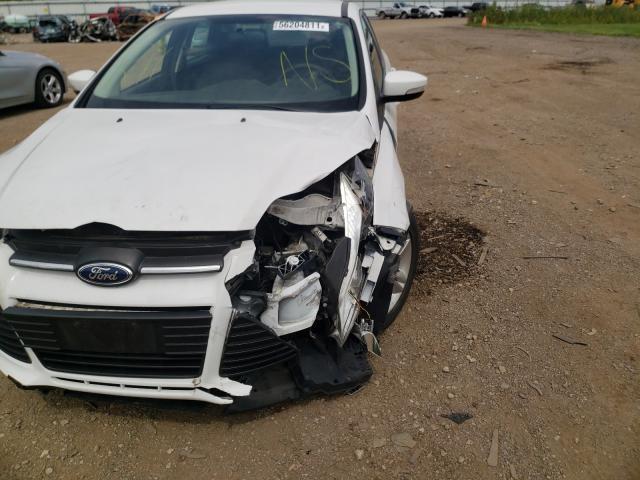 Photo 8 VIN: 1FADP3F28DL373143 - FORD FOCUS SE 