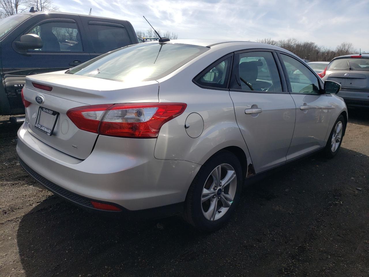 Photo 2 VIN: 1FADP3F28EL125489 - FORD FOCUS 