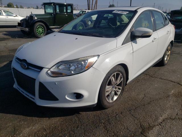 Photo 1 VIN: 1FADP3F28EL179066 - FORD FOCUS SE 