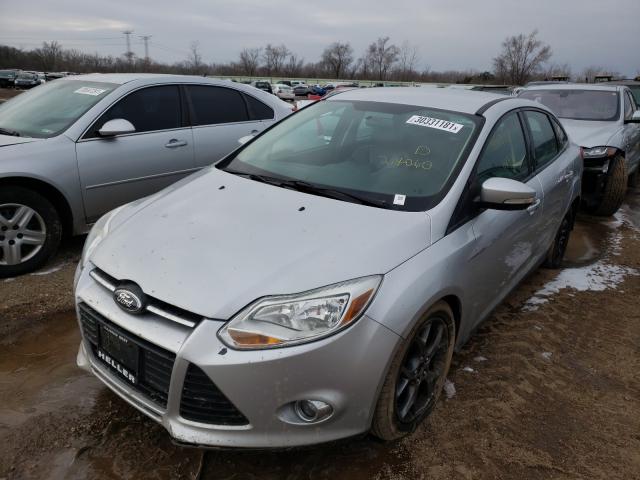 Photo 1 VIN: 1FADP3F28EL214060 - FORD FOCUS SE 