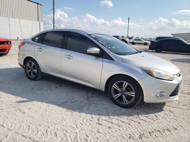 Photo 3 VIN: 1FADP3F28EL233692 - FORD FOCUS SE 