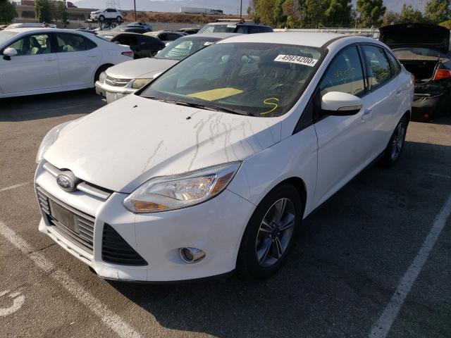 Photo 1 VIN: 1FADP3F28EL259922 - FORD FOCUS SE 