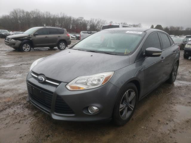 Photo 1 VIN: 1FADP3F28EL262593 - FORD FOCUS SE 