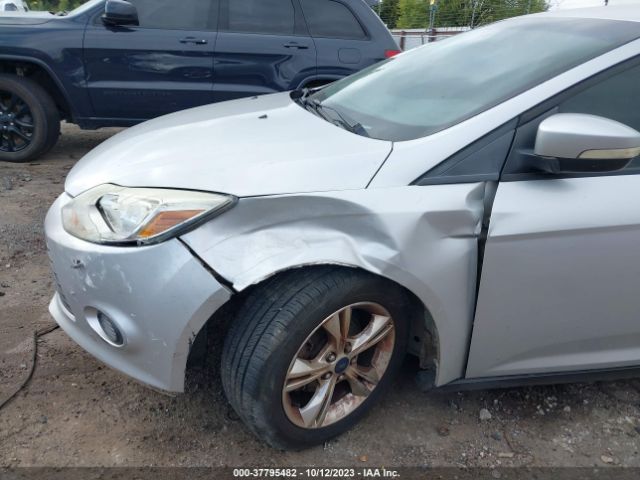 Photo 5 VIN: 1FADP3F28EL302073 - FORD FOCUS 