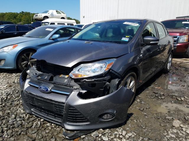 Photo 1 VIN: 1FADP3F28EL359308 - FORD FOCUS SE 