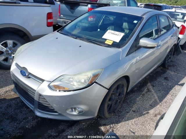 Photo 1 VIN: 1FADP3F28EL381597 - FORD FOCUS 